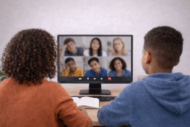 mom and a youth attend an online meeting
